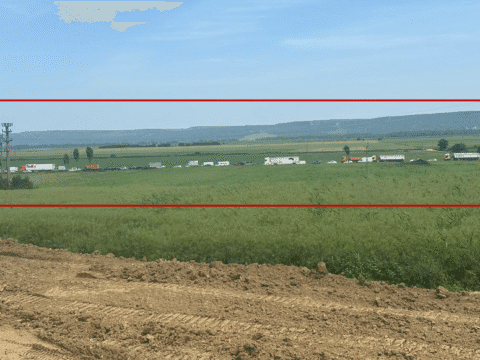 Foto inedit. Coloană impresionantă de mașini la ieșirea din Adjud spre Focșani, după un accident pe podul peste Trotuș.